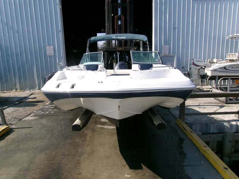 Slide: The Image of 2016 Hurricane SunDeck 187 OB boat in storage facility. - 9