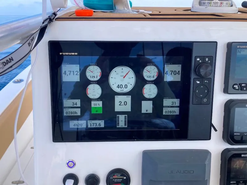 Slide: The Image of Control panel of a 2023 Prowler 25 boat displaying engine metrics and navigation data. - 23