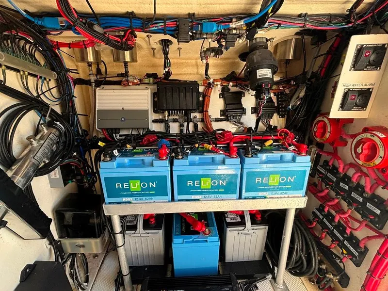 Slide: The Image of Electrical system setup in a 2023 Prowler 25, featuring Relion batteries and organized wiring. - 28