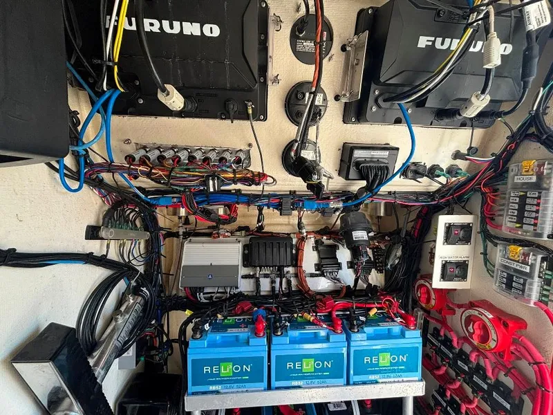 Slide: The Image of Electrical system setup in a 2023 Prowler 25 boat with batteries and wiring. - 30