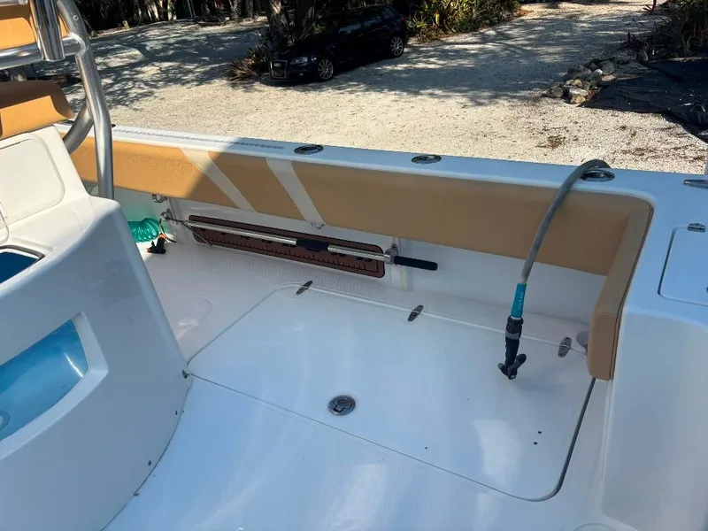 Slide: The Image of 2023 Prowler 25 boat deck with seating and hose attachment. - 36