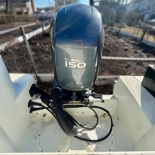 Slide: The Image of 2008 Sailfish 218 WAC boat with Yamaha 150 outboard motor. - 13