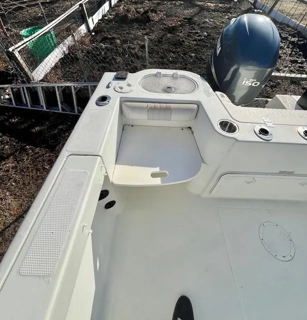 Slide: The Image of 2008 Sailfish 218 WAC boat deck with Yamaha 150 outboard motor. - 16