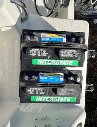 Slide: The Image of Three Interstate marine batteries on a 2008 Sailfish 218 WAC boat deck. - 21