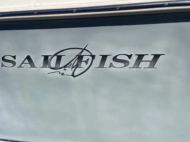 Slide: The Image of 2008 Sailfish 218 WAC boat logo on hull. - 6