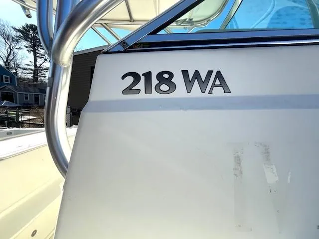 Slide: The Image of 2008 Sailfish 218 WAC boat exterior with model number visible. - 7