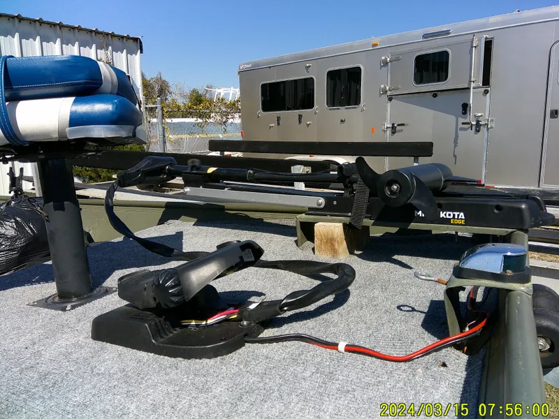 Slide: The Image of 2018 Alumacraft 1648 Jon boat deck with trolling motor and seat. - 4