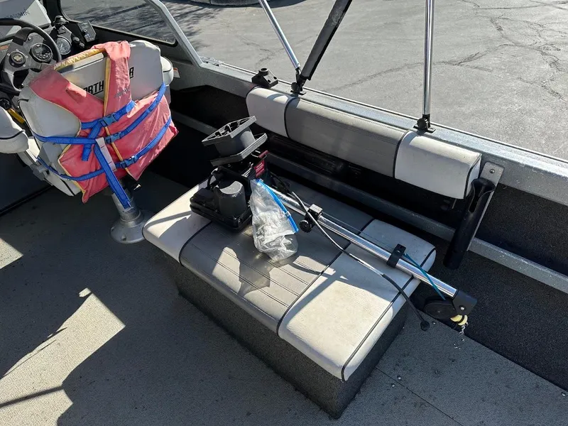 Slide: The Image of Interior of a 2000 North River 19 Sportster boat with life jacket and equipment. - 20