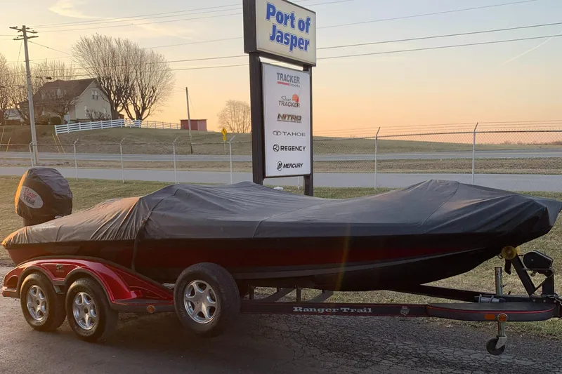 Slide: The Image of 2006 Ranger Z20 Comanche boat covered on trailer at Port of Jasper. - 9