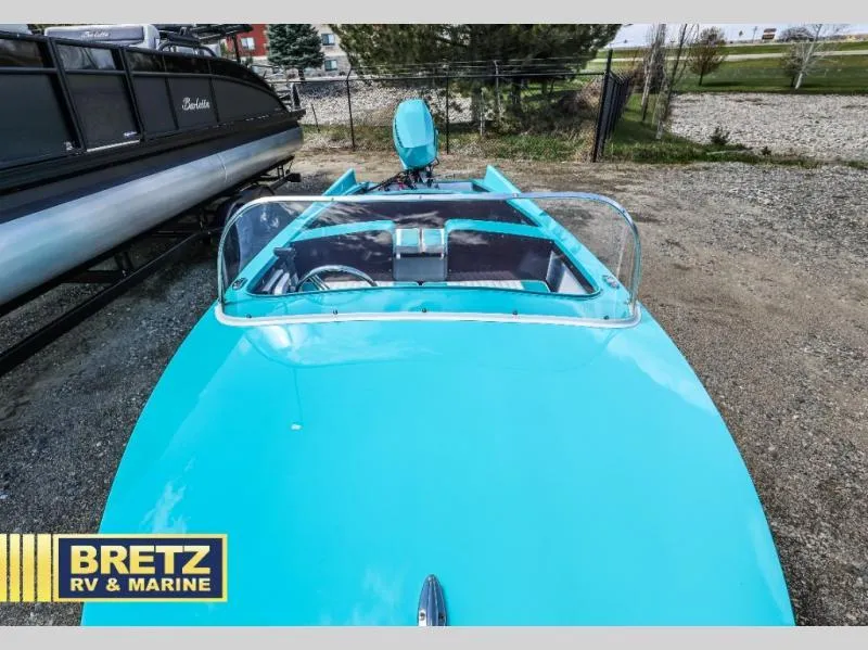 Slide: The Image of Turquoise 2025 Starcraft 57 SKI CHAMP boat at Bretz RV & Marine dealership. - 14