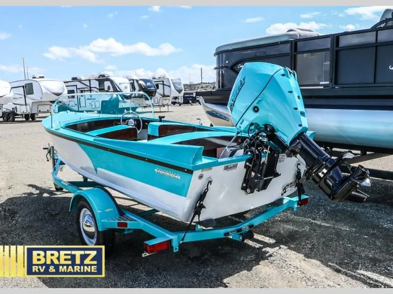 Slide: The Image of 2025 Starcraft 57 SKI CHAMP boat in turquoise, displayed at Bretz RV & Marine. - 4