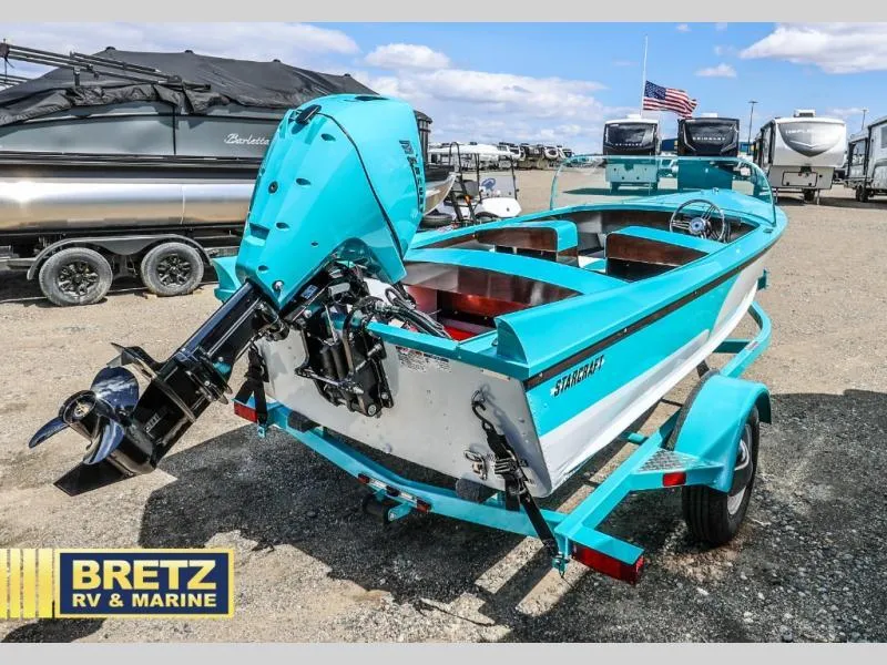 Slide: The Image of 2025 Starcraft 57 SKI CHAMP boat in vibrant blue at Bretz RV & Marine. - 6