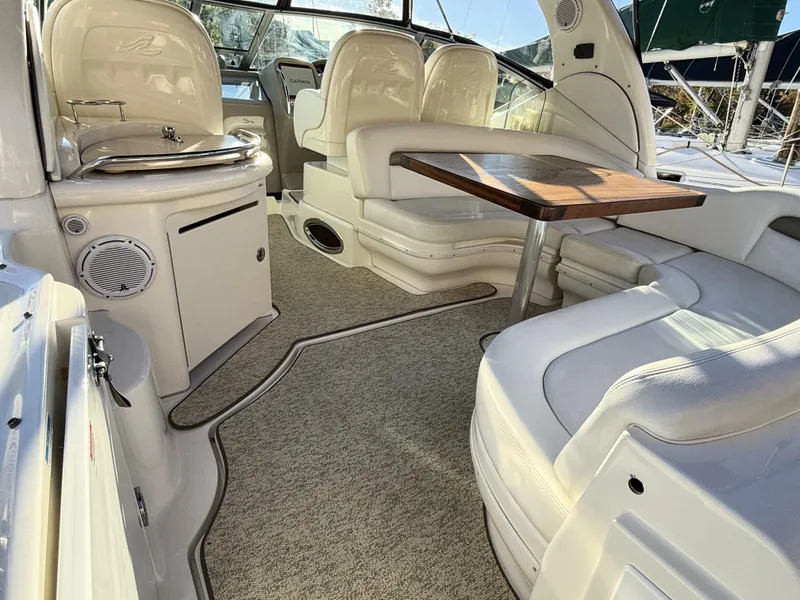 Slide: The Image of Luxurious interior of 2007 Sea Ray 340 Sundancer yacht with seating and table. - 12