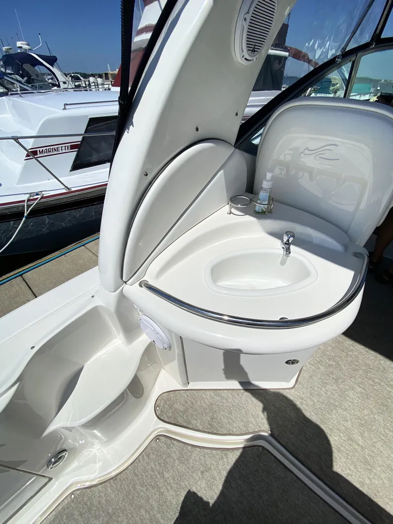 Slide: The Image of 2007 Sea Ray 340 Sundancer boat interior with sink and seating area. - 14