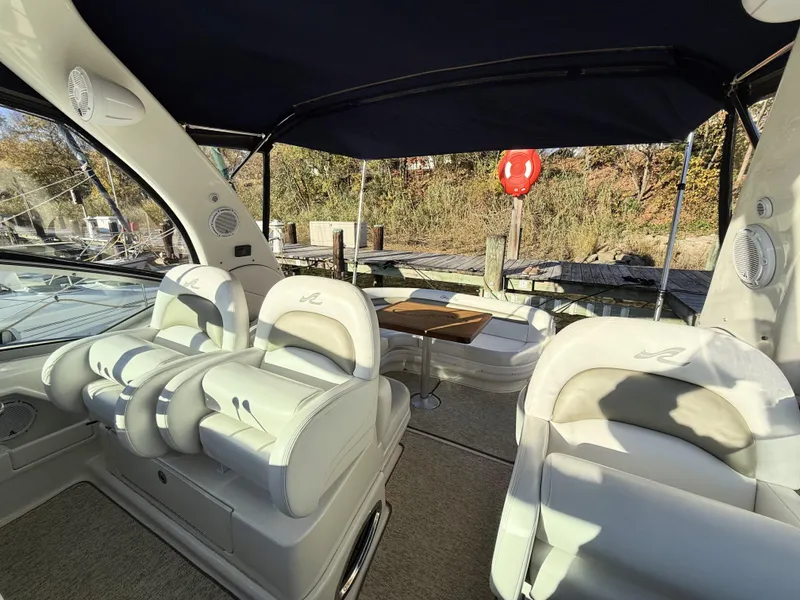 Slide: The Image of Interior of 2007 Sea Ray 340 Sundancer yacht with plush seating and table. - 20