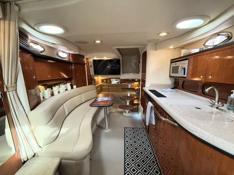 Slide: The Image of Luxurious interior of 2007 Sea Ray 340 Sundancer yacht with modern amenities and elegant design. - 29