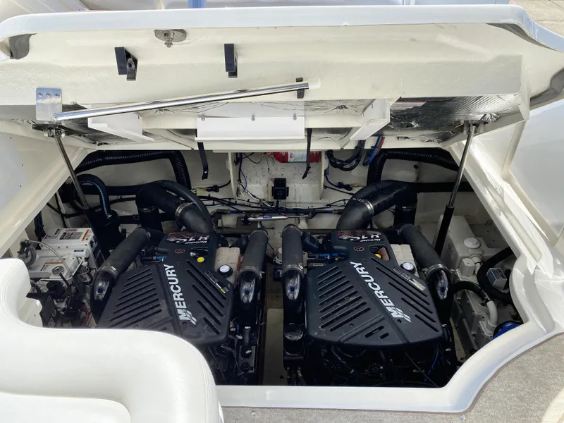 Slide: The Image of Engine compartment of a 2007 Sea Ray 340 Sundancer with twin Mercury engines. - 36