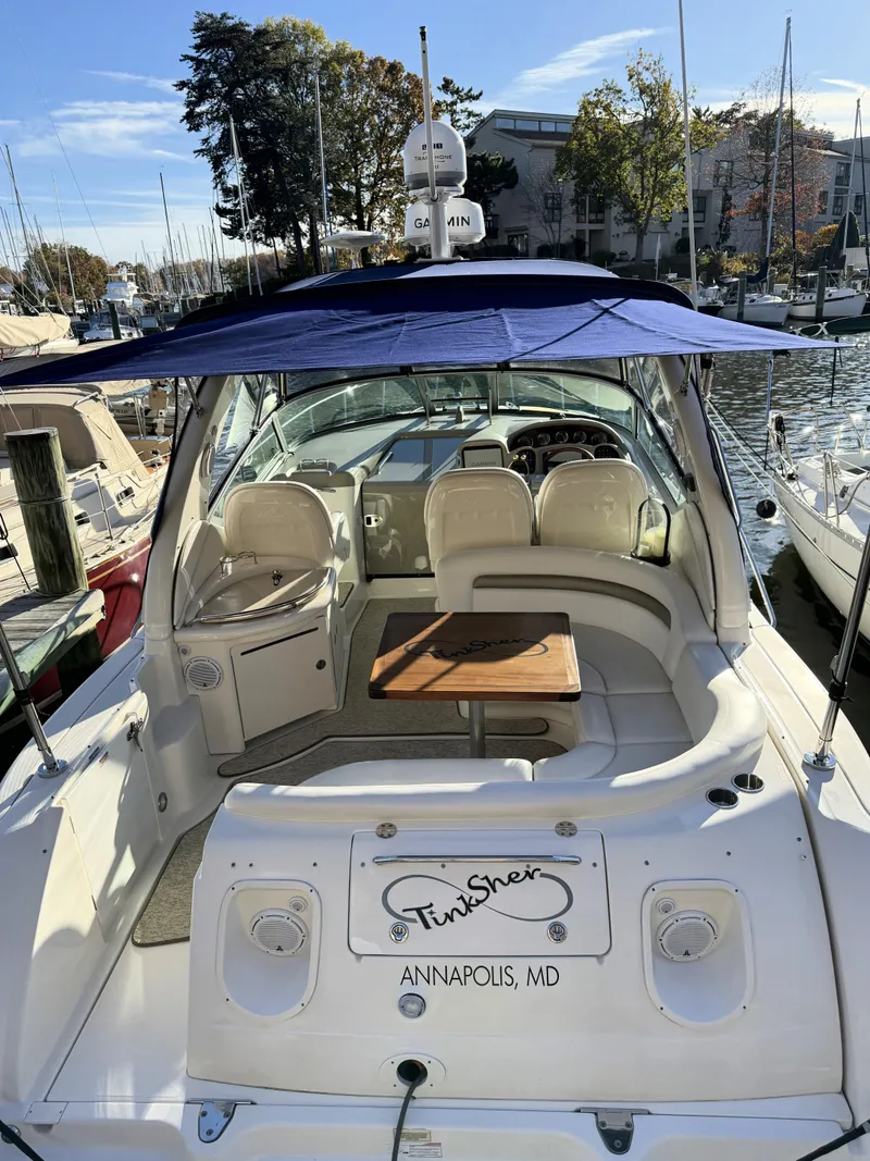 Slide: The Image of 2007 Sea Ray 340 Sundancer docked in Annapolis, MD, featuring spacious seating and canopy. - 9