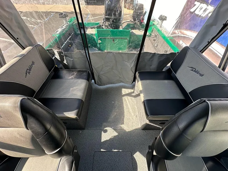 Slide: The Image of Interior of 2023 Weldcraft 18 Angler Sport boat with seating and protective cover. - 23