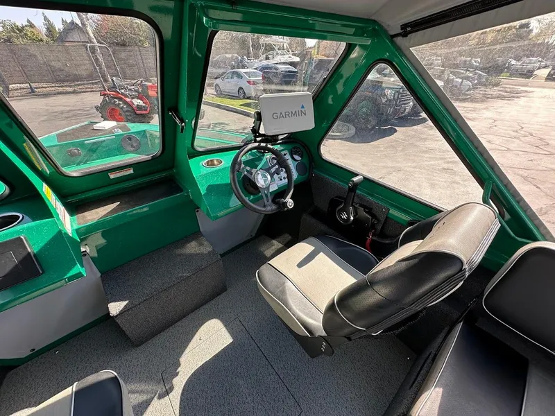 Slide: The Image of 2023 Weldcraft 18 Angler Sport boat interior with Garmin navigation system. - 26