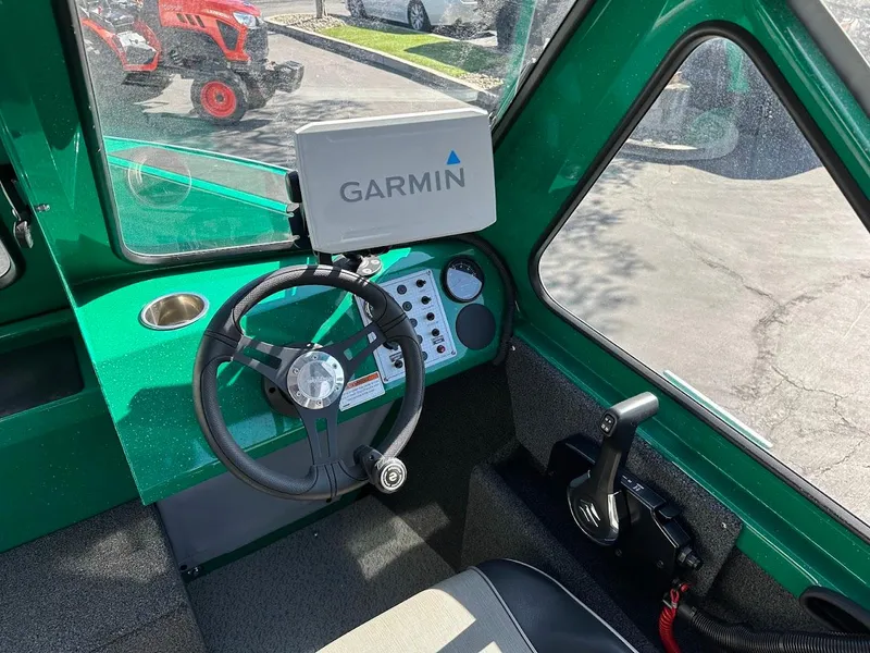 Slide: The Image of 2023 Weldcraft 18 Angler Sport boat cockpit with Garmin navigation system. - 27