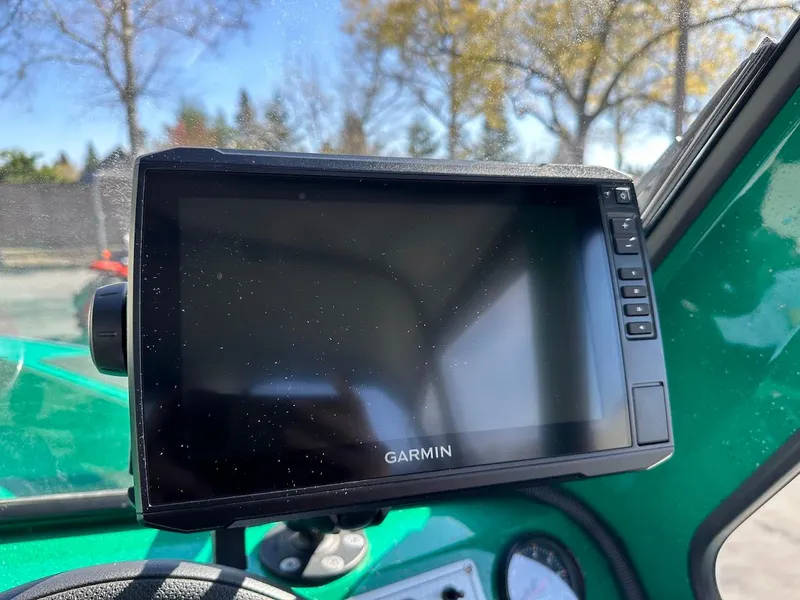 Slide: The Image of Garmin display on 2023 Weldcraft 18 Angler Sport boat dashboard, sunny day. - 28