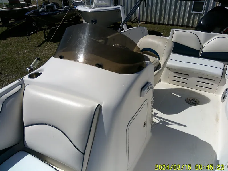 Slide: The Image of 2006 Hurricane Fun Deck 194 boat interior with seating and console. - 15