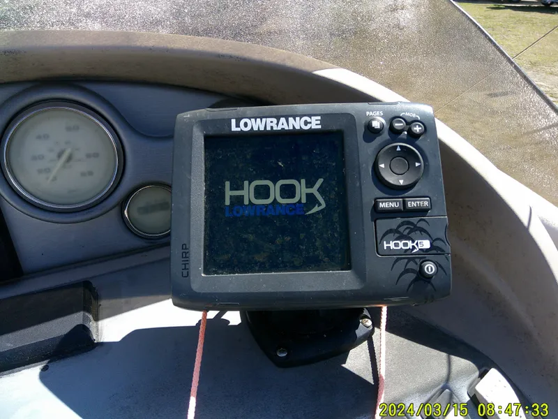 Slide: The Image of Lowrance Hook fish finder on 2006 Hurricane Fun Deck 194 boat dashboard. - 20