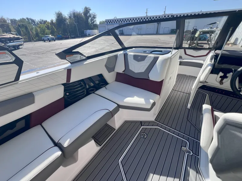 Slide: The Image of 2021 Nautique Super Air G23 interior with sleek seating and modern design. - 10