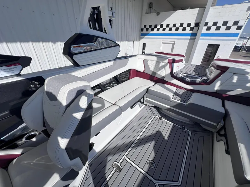 Slide: The Image of 2021 Nautique Super Air G23 interior with sleek seating and modern design. - 15