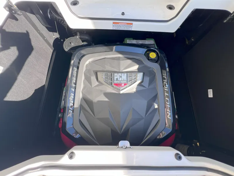 Slide: The Image of 2021 Nautique Super Air G23 engine compartment with PCM engine cover. - 17