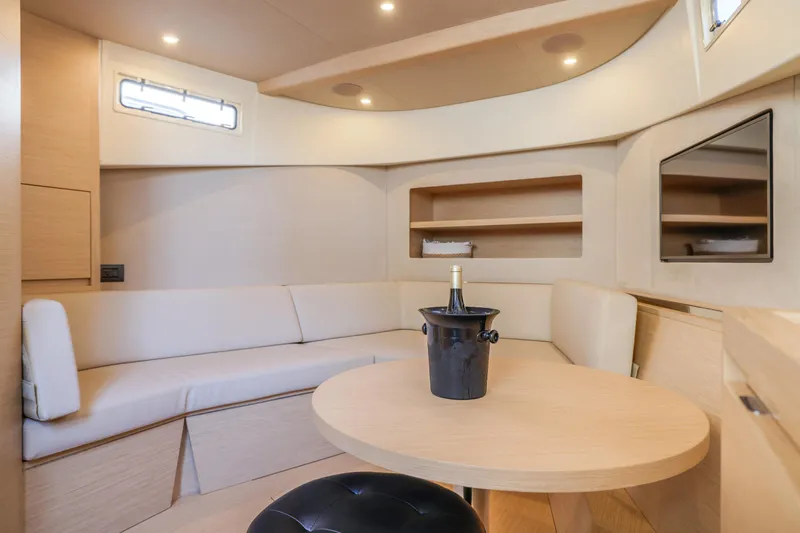Slide: The Image of Luxurious interior of 2022 Solaris Power yacht with elegant seating and champagne on table. - 16