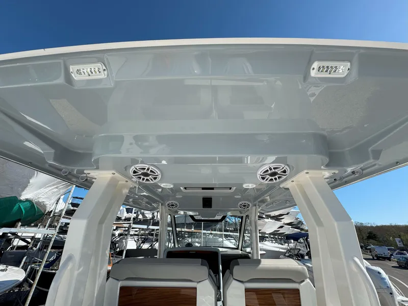 Slide: The Image of 2025 Pursuit S 328 boat interior with modern design and integrated speakers. - 25
