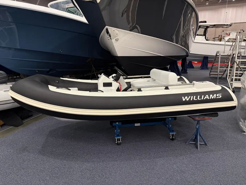 The Image of 2024 Williams Jet Tenders Sportjet 345 on display indoors. - 1