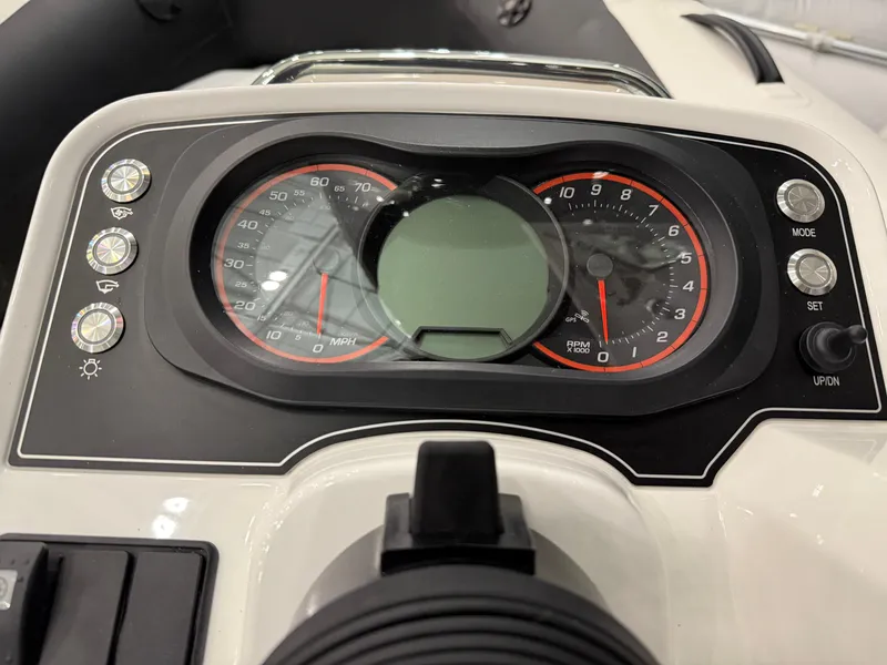 Slide: The Image of Dashboard of 2024 Williams Jet Tenders Sportjet 345 with speedometer and controls. - 16