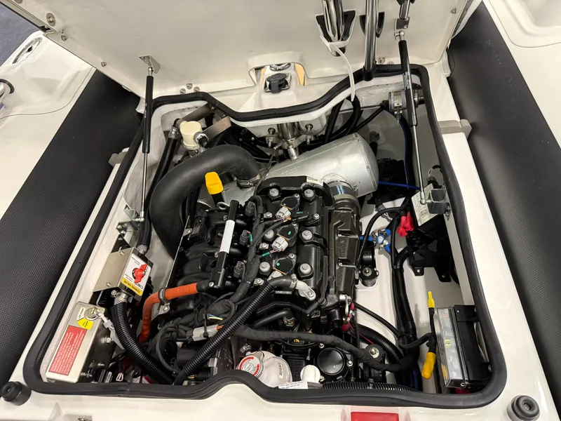 Slide: The Image of 2024 Williams Jet Tenders Sportjet 345 engine compartment, showcasing detailed mechanical components. - 19