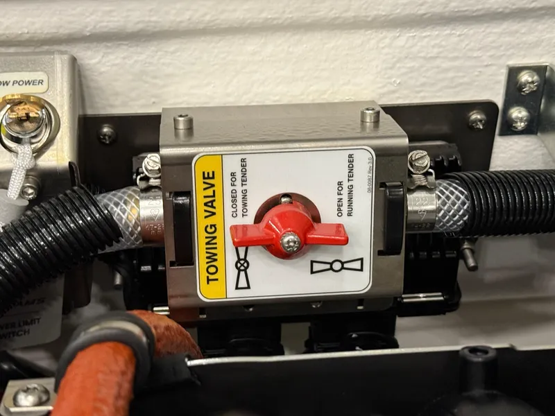 Slide: The Image of Towing valve on 2024 Williams Jet Tenders Sportjet 345, showing open and closed positions. - 20