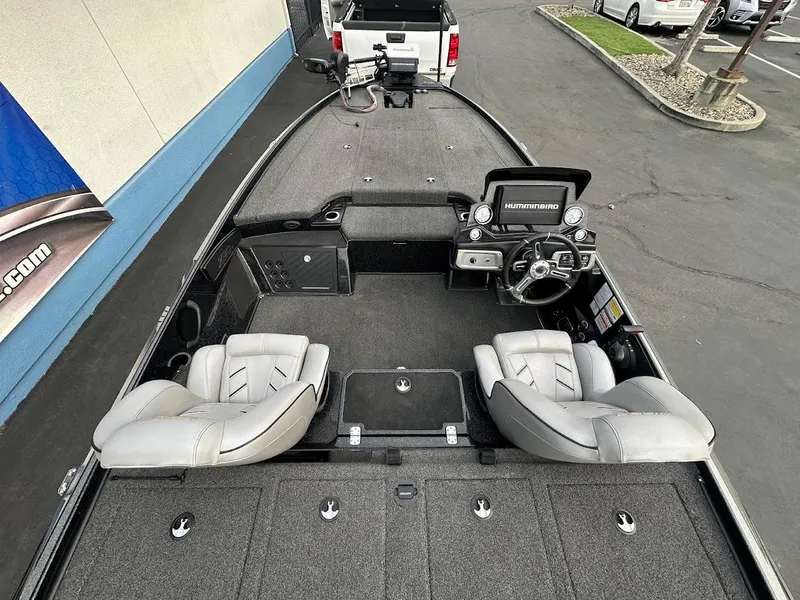 Slide: The Image of 2021 Nitro Z20 Pro boat interior with dual seats and modern dashboard. - 10