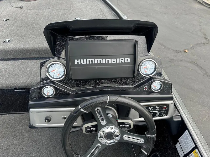 Slide: The Image of Dashboard of a 2021 Nitro Z20 Pro boat with Humminbird display and gauges. - 13