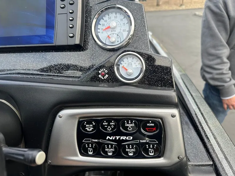 Slide: The Image of Dashboard of a 2021 Nitro Z20 Pro boat with gauges and control panel. - 15
