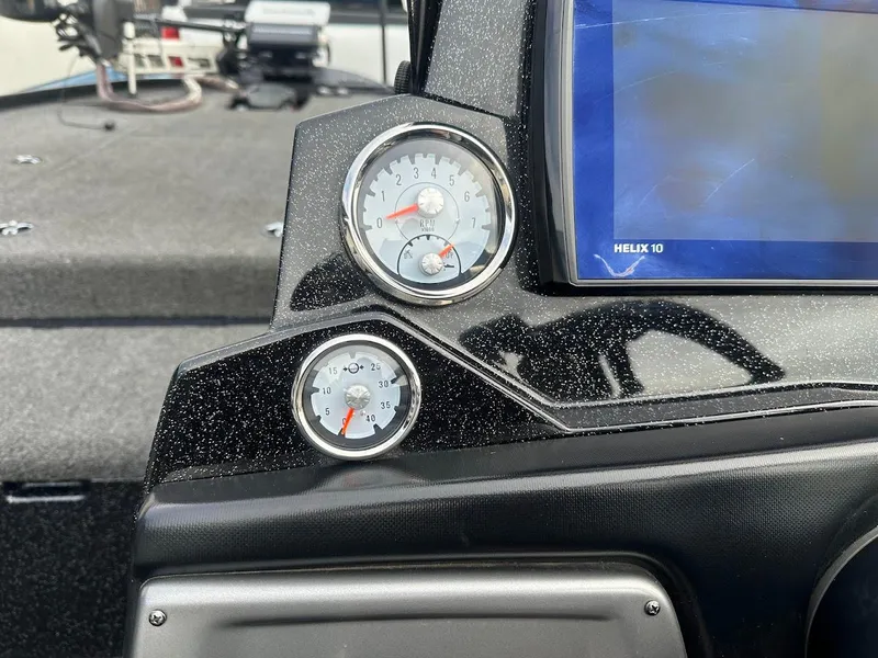 Slide: The Image of Dashboard of 2021 Nitro Z20 Pro boat with gauges and Helix 10 display. - 16