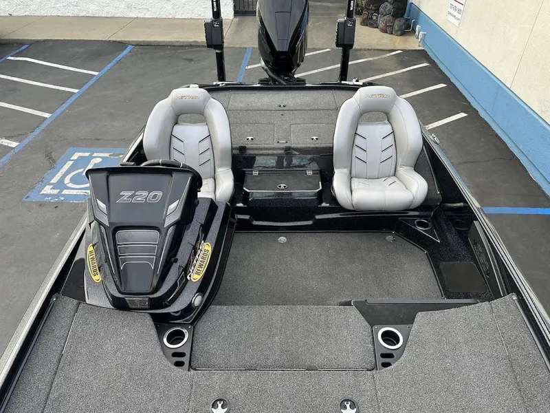 Slide: The Image of 2021 Nitro Z20 Pro boat interior with dual seats and storage compartments. - 22
