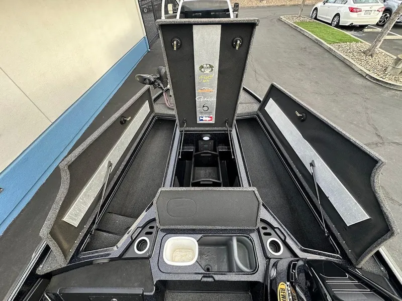 Slide: The Image of 2021 Nitro Z20 Pro boat storage compartments open, showcasing spacious interior design. - 23