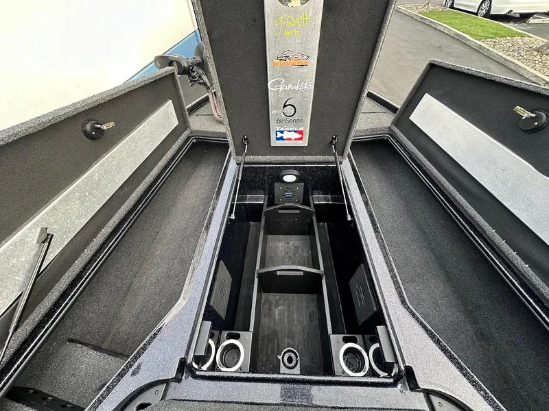 Slide: The Image of Open storage compartments of a 2021 Nitro Z20 Pro boat, showcasing interior design. - 25