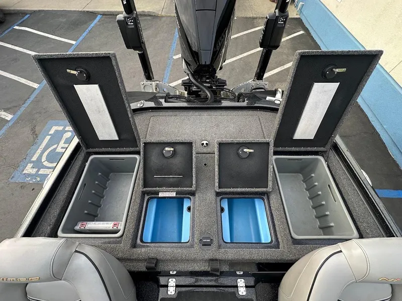 Slide: The Image of Nitro Z20 Pro 2021 boat storage compartments with open lids, showcasing interior layout. - 28