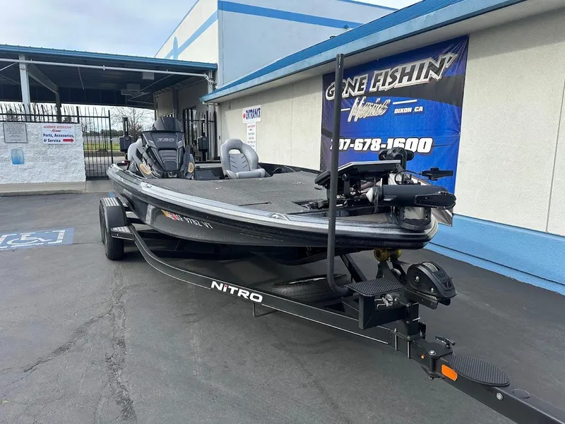 Slide: The Image of Nitro Z20 Pro 2021 fishing boat on trailer outside dealership. - 3