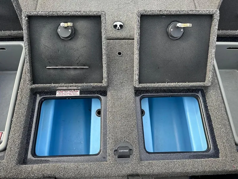 Slide: The Image of Interior compartments of a 2021 Nitro Z20 Pro boat, featuring dual storage spaces. - 30