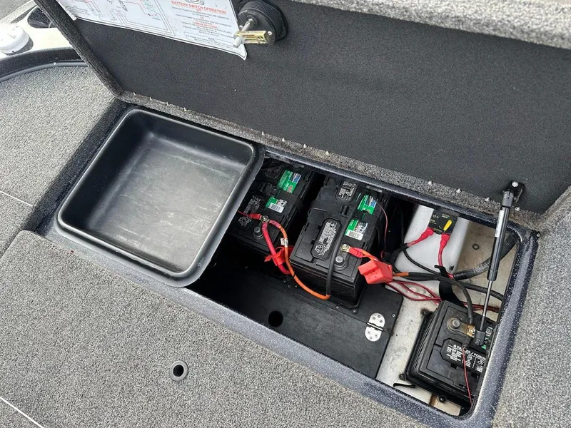 Slide: The Image of 2021 Nitro Z20 Pro battery compartment with wiring and storage tray. - 32