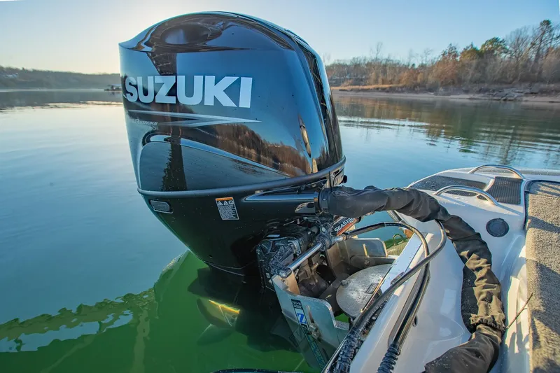 Slide: The Image of 2017 Phoenix 618 Pro boat with Suzuki outboard motor on calm lake. - 15