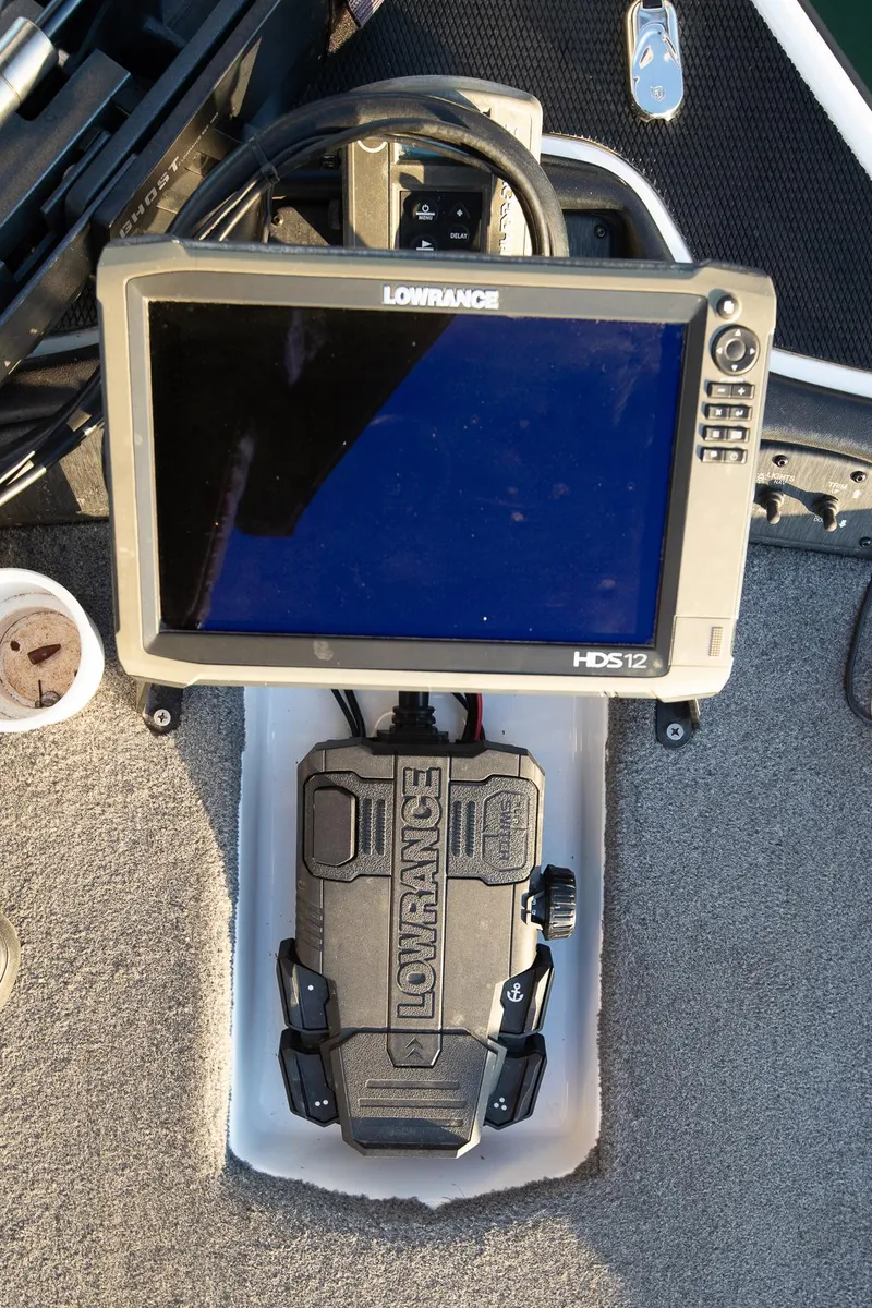 Slide: The Image of Lowrance HDS-12 fishfinder on Phoenix 618 Pro, 2017 model, mounted on boat deck. - 27